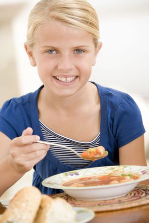 3506607 - girl eating soup