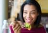 45334789 - woman eating fresh salad