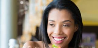 45334789 - woman eating fresh salad