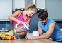 52031489 - couple making smoothie