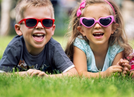 22306338 - cute children with sunglasses